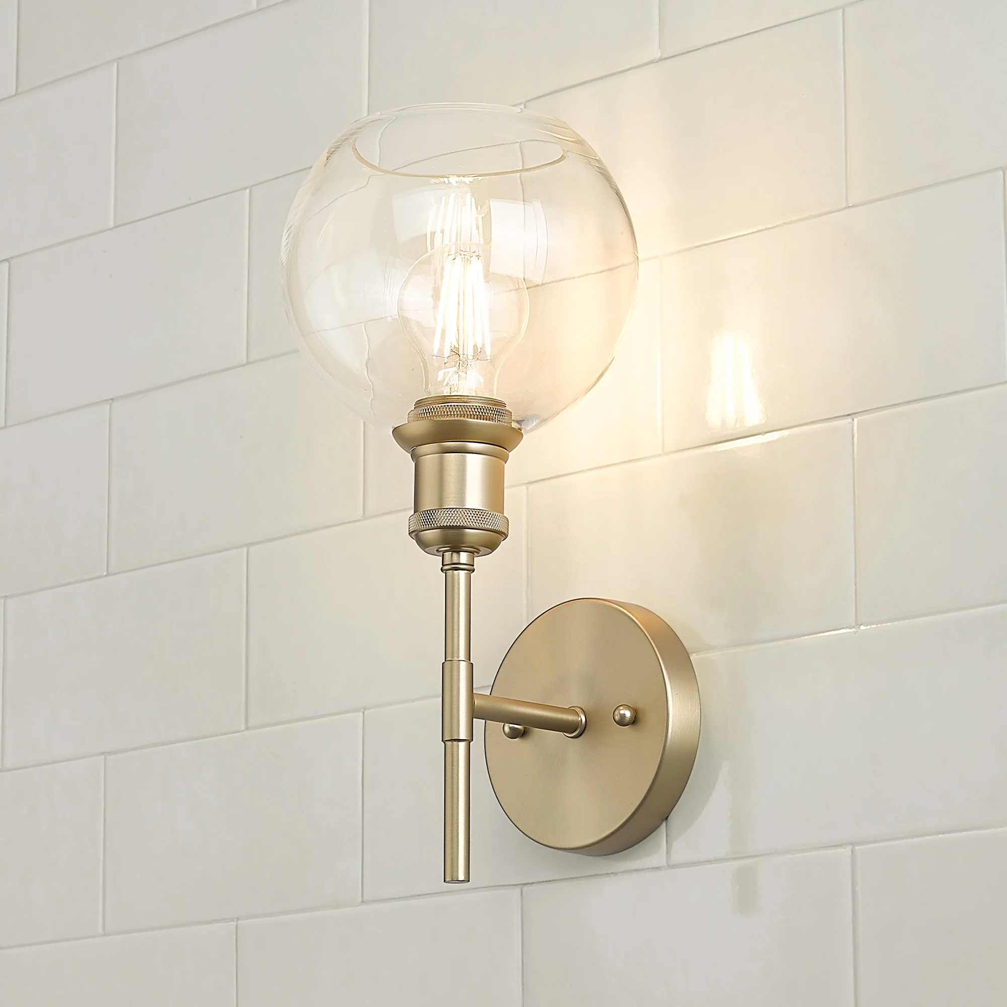 Axel 1-light Wall Sconce in Brushed Champagne Brass and Globe Clear Glass - Image 6